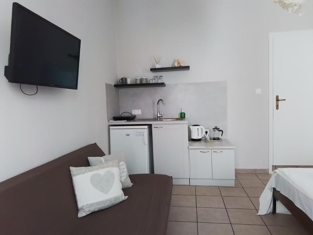 Morpheus Rooms Kini Esterno foto