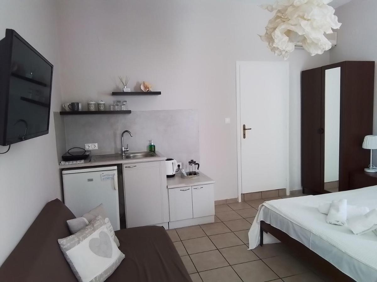 Morpheus Rooms Kini Esterno foto