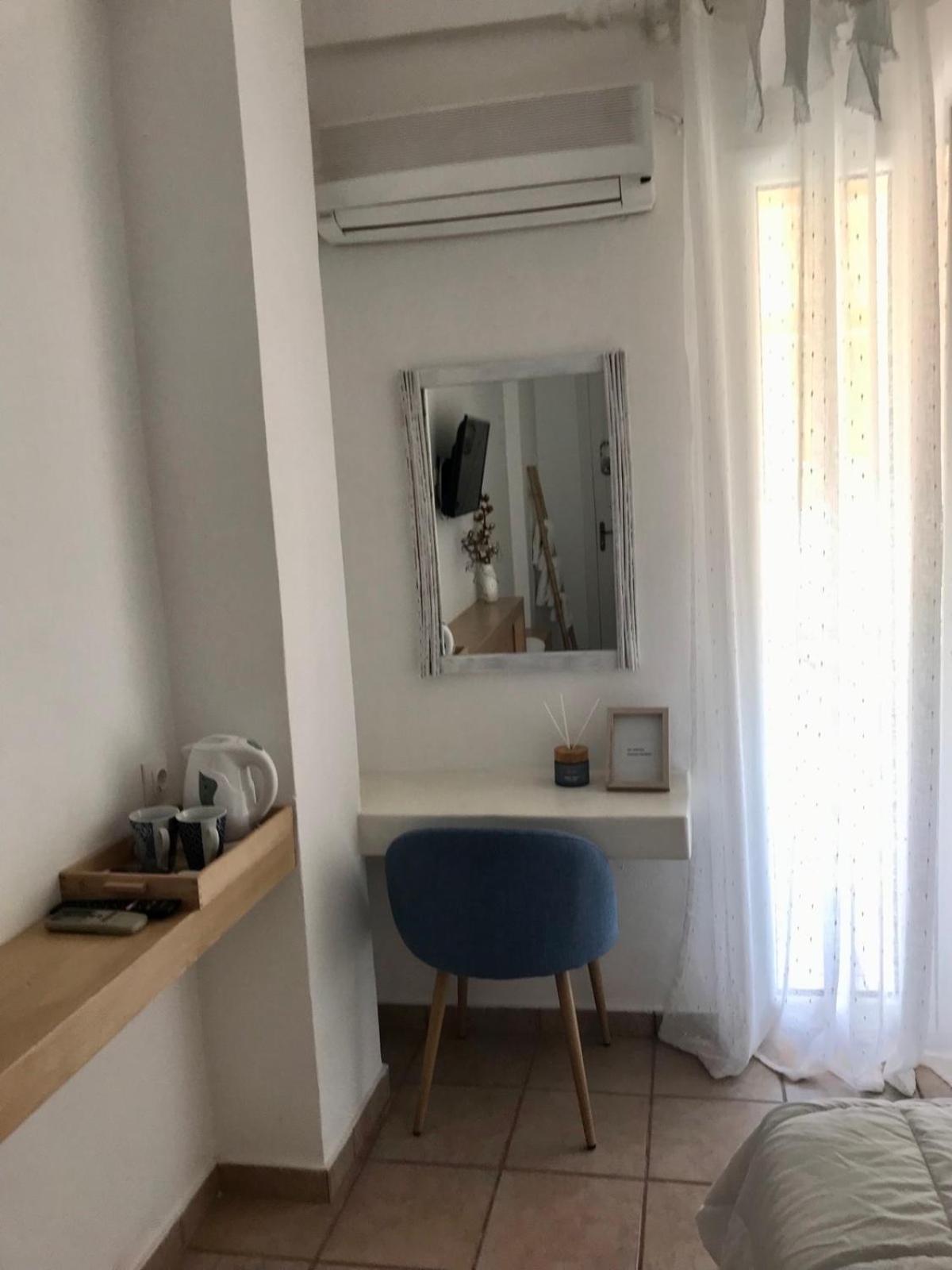Morpheus Rooms Kini Esterno foto