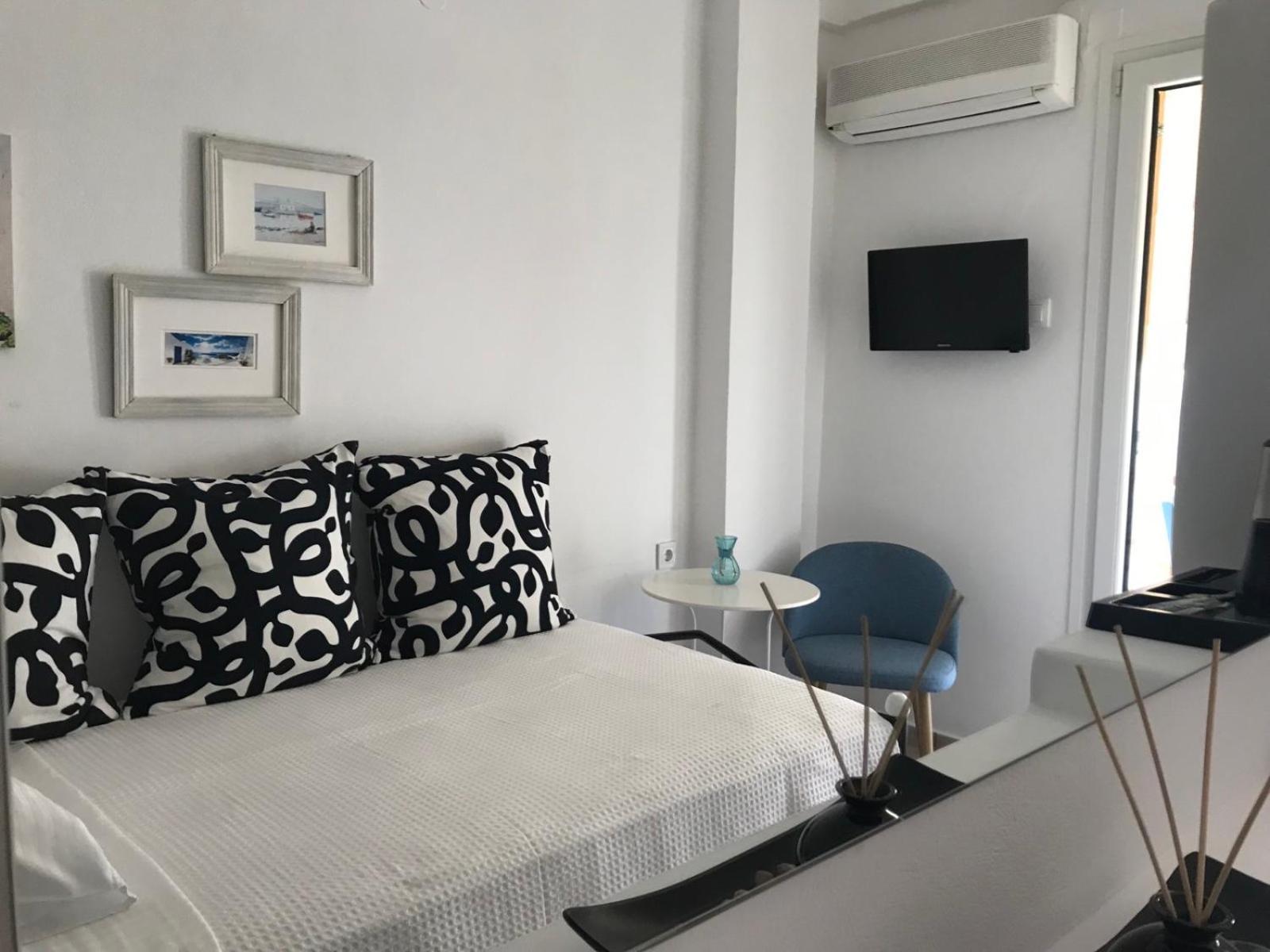 Morpheus Rooms Kini Esterno foto